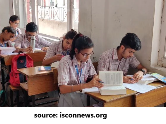 student reading bhagvad git in classroom